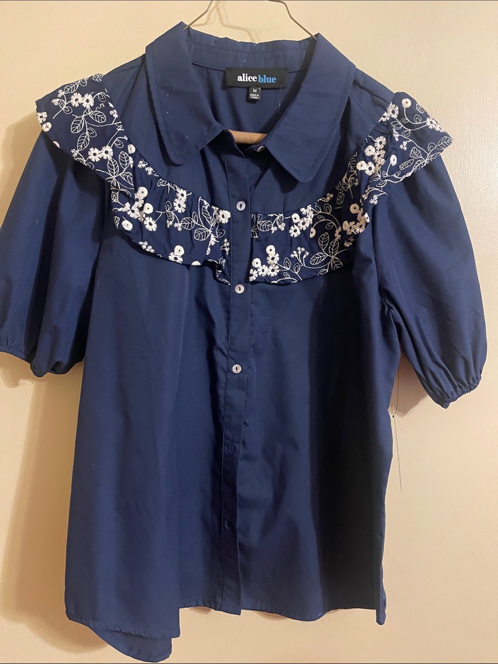 Alice Blue Navy Blouse with White Floral Ruffle